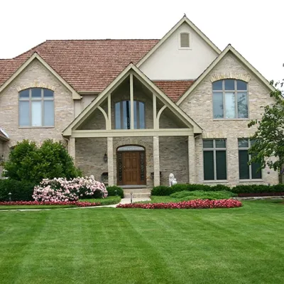 house with green healthy lawn