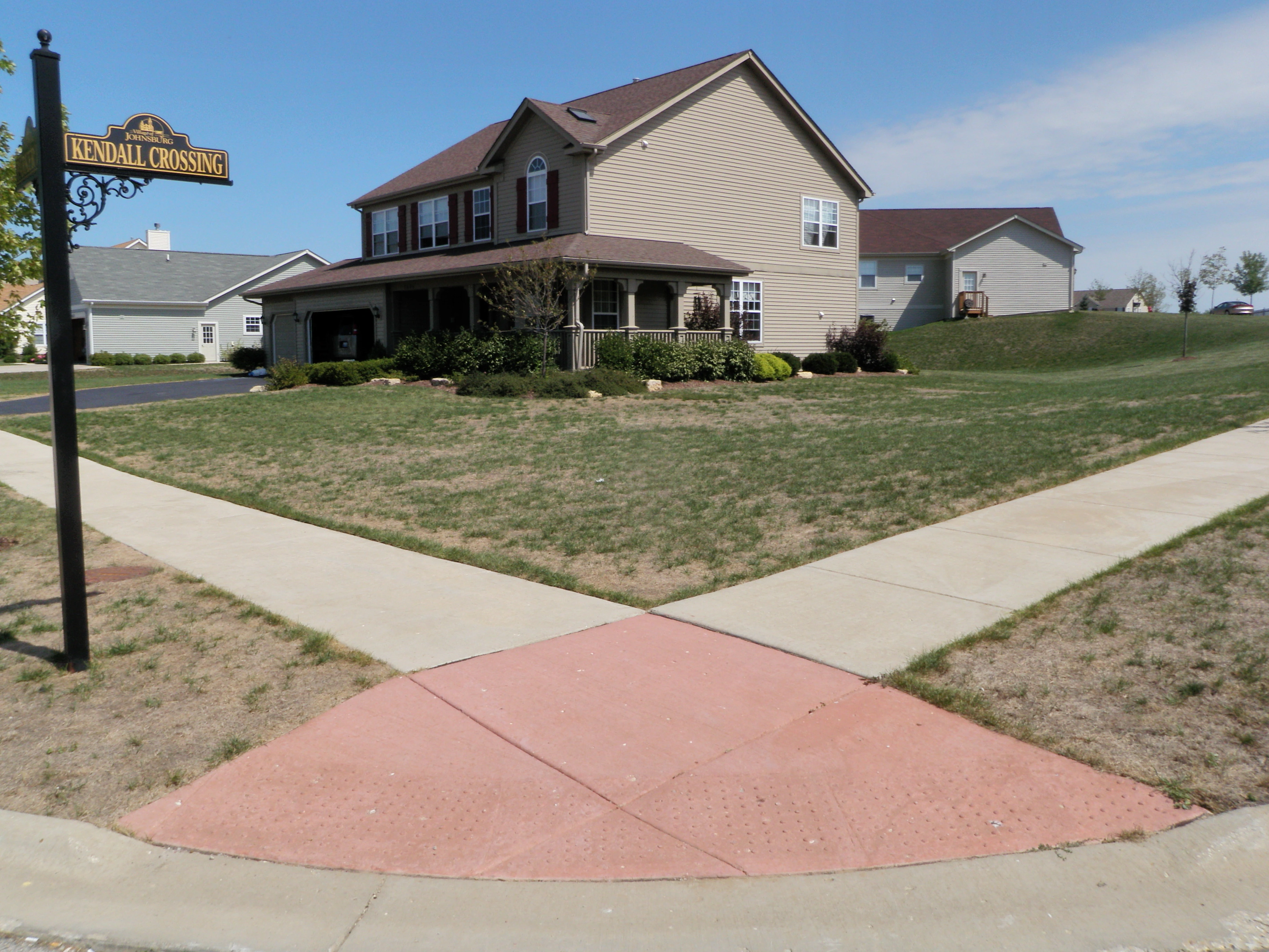 STREET CORNER WITH BROWN PATCHES